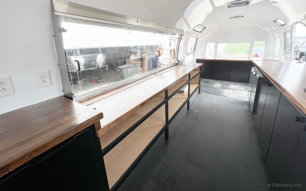 Kairos Coffee Roasting Airstream trailer interior with open shelving