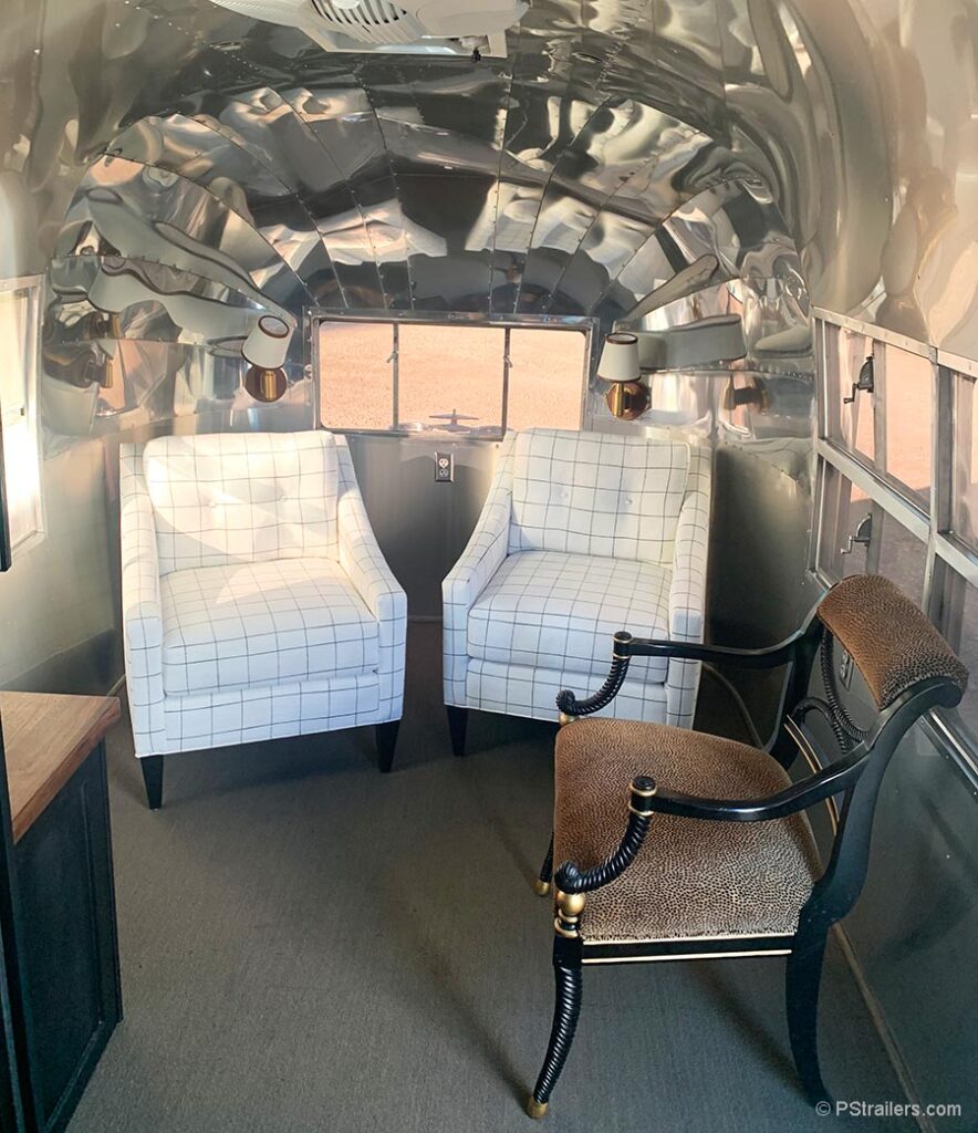 Airstream with interior aluminum endcap with rivets