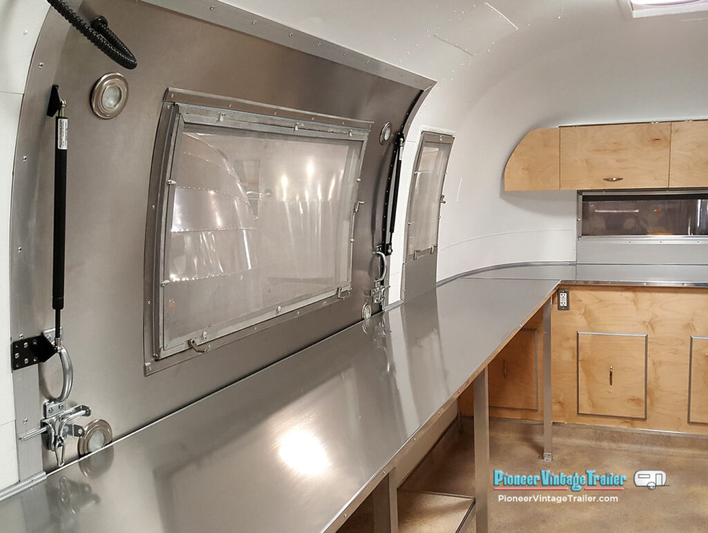 Serving window in Airstream Coffee Bar w/LED puck lights