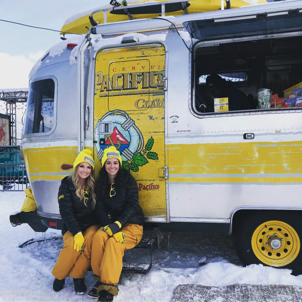 Pacifico Cerveza beer marketing / serving trailer at X-Games snow with girls