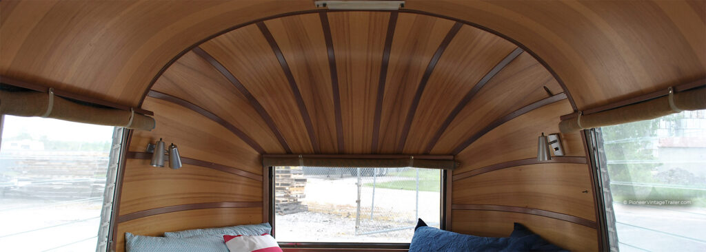 Hickory wrapped interior endcap - 1964 Airstream Safari