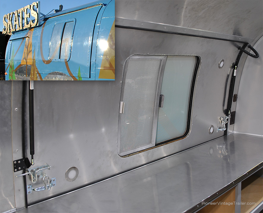 Sliding serving window in Airstream opening side hatch. Colorado Basecamp skate rental trailer.